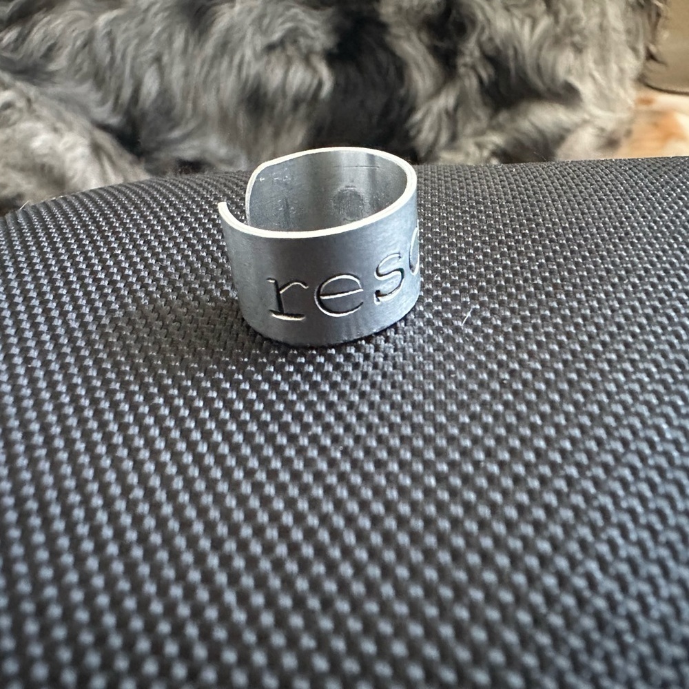 Modern Silver stamped “rescue” Wide Band Ring